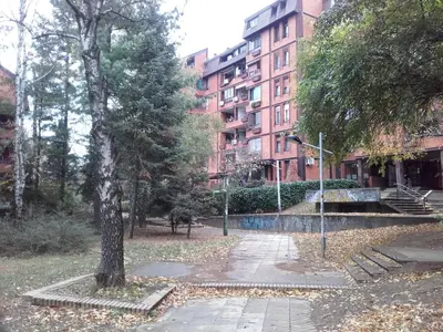 a park in front of a building with a skate park at Breeze Apartment in Žarkovo