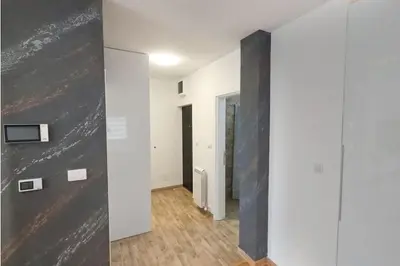 a room with white walls and a black wall at Urban Haven in Ledine