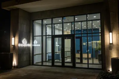 an entrance to a building with a large glass door at SD Luxury Apartment - Belgrade Waterfront - KARE Design - River View in Belgrade