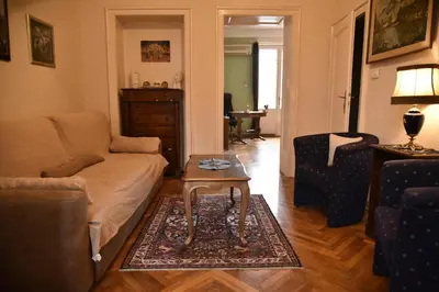 a living room with a couch and a coffee table at Belgrade Center Bohemian Quarter in Belgrade