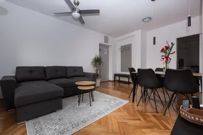 a living room with a couch and a table at Centrum 3 in Belgrade