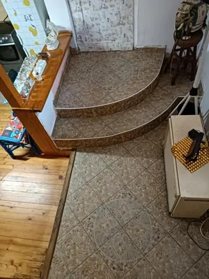 two sets of stairs in a room with carpet at Maravilja 7 in Belgrade