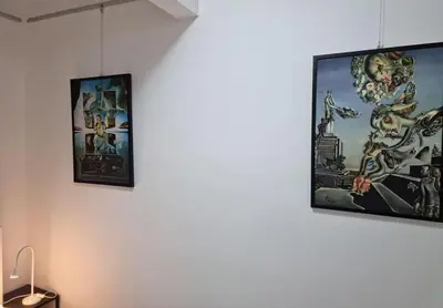 three framed pictures hanging on a wall at Dali Arena Business Comfort Apartment 2 Bedrooms King Size in Belgrade