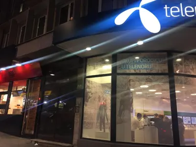 a store front of a restaurant at night at Apartment Baroque in Belgrade