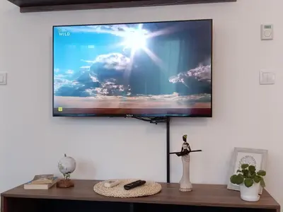 a flat screen tv hanging on a wall at Tera apartment Zemun in Belgrade