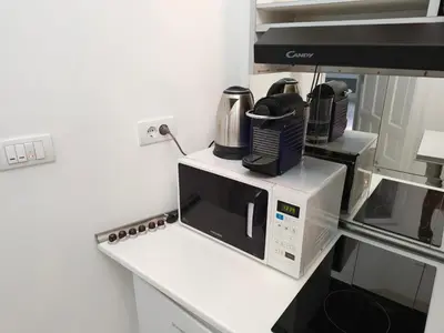 a microwave oven sitting on top of a counter at Sofi1 in Belgrade