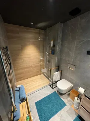 a bathroom with a shower and a toilet at Belgrade Waterfront Luxury Apartment in Belgrade