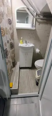a small bathroom with a sink and a toilet at Stan na dan-MARKOVIĆ- in Dušanovac (historical)