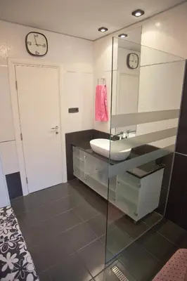 a bathroom with a sink and a mirror at Angel Apartment in Belgrade