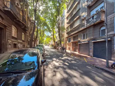 a car parked on the side of a street at Belgrade City Center Modern Apartment in Belgrade