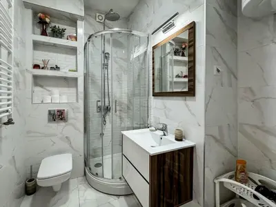 a bathroom with a shower and a sink and a toilet at Old Town Central Apartment in Belgrade