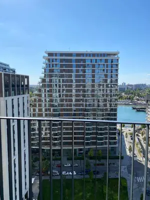 a view of a large apartment building from a balcony at Voyager 360, FREE PRIVATE PARKING in Belgrade