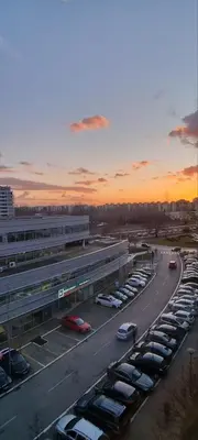 a parking lot with a bunch of parked cars at Mimoza in Novi Beograd