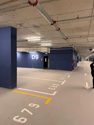 an empty parking lot in an empty parking garage at Belgrade Center Apartment Lux 1 in Belgrade