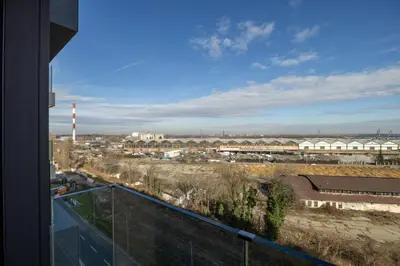 a view of a factory from the balcony of a building at Belgrade Center Apartment Lux 1 in Belgrade
