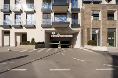 an empty parking lot in front of a building at Belgrade Center Apartment Lux 1 in Belgrade