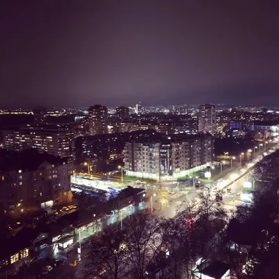 a city at night with street lights and buildings at City View 00-24 in Belgrade