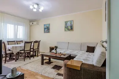 a living room with a couch and a table at City View 00-24 in Belgrade