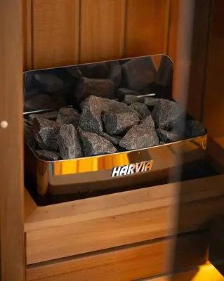 a container of rocks in a wooden drawer at Ilic House in Belgrade