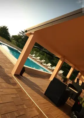a patio with a view of a swimming pool at Ilic House in Belgrade