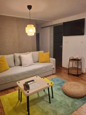 a living room with a couch and a coffee table at Park in Lazarevac