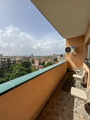 a balcony with a view of a city at Apartment Wellness in Belgrade