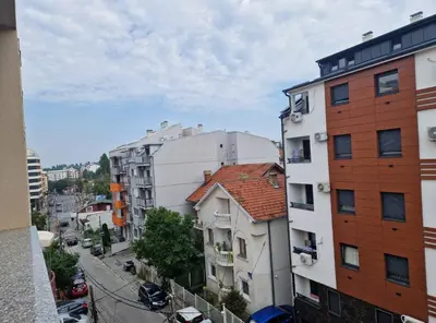 a view of a city street with buildings at Stan na dan Beograd in Mirijevo