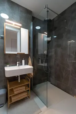 a bathroom with a sink and a shower at Giulia apartment Belgrade Novi Dorcol in Belgrade