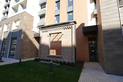 a building with a window on the side of it at Giulia apartment Belgrade Novi Dorcol in Belgrade