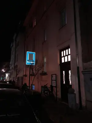 a tv on the side of a building at night at XENIA2 in Belgrade
