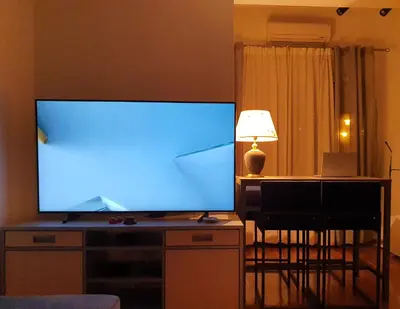 a large flat screen tv sitting on top of a desk at Lavanda in Belgrade