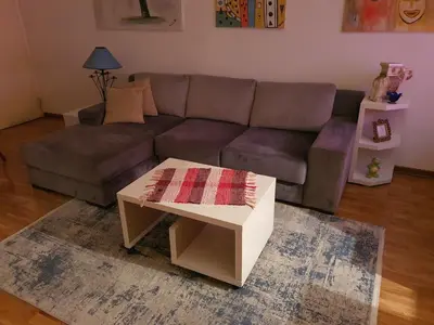 a living room with a couch and a coffee table at Lavanda in Belgrade