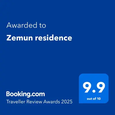 a blue sign with the text awarded to zenivan residence at Zemun residence in Novi Grad