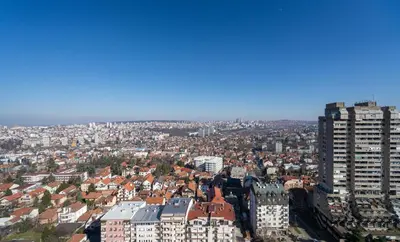 an aerial view of a city with tall buildings at Victor Nest Double Room Apartment in Belgrade