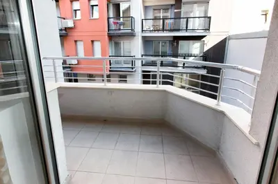 a balcony with a view of a building at Apartment 32 in Belgrade