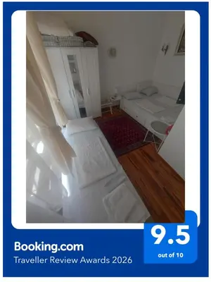 a view of a bedroom with a bed in a room at Tsar Dušan Apartment in Belgrade