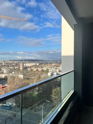 a view of a city from the balcony of a building at IVA HOME Apartment in Belgrade