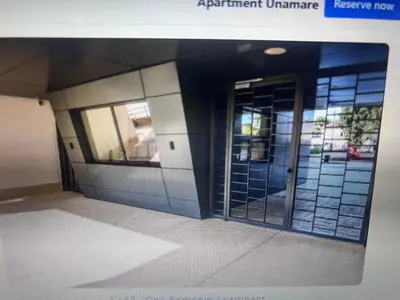an office building with glass doors in a building at IVA HOME Apartment in Belgrade