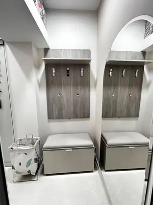 a locker room with two lockers and a mirror at Apartman Natali in Karaburma