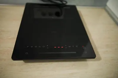 a laptop computer sitting on top of a table at Sunset Apartment in Smederevo