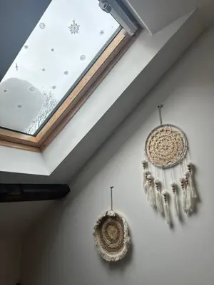 a skylight in a ceiling with two chandeliers at ŠTAB 2 City Centre (free parking) Dorcol in Belgrade