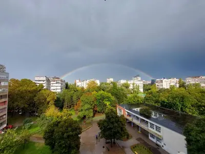 a view of a city with buildings and trees at Cozy studio apartment in Belgrade