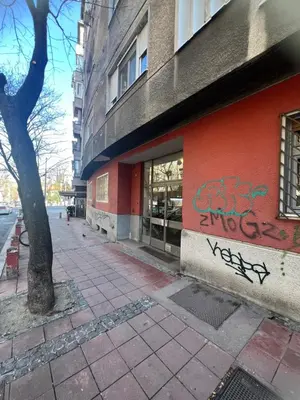 a building with graffiti on the side of it at Orange Place Studio in Belgrade