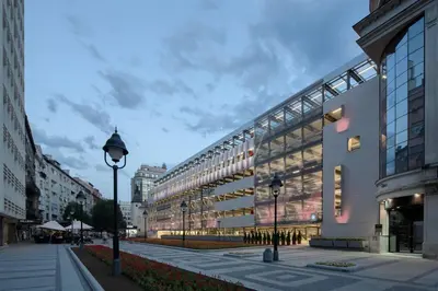 a large building in a city with a street light at Center Obi-One in Belgrade