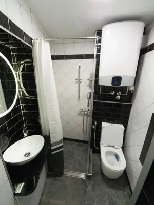 a small bathroom with a toilet and a sink at Galerija MARSHAL in Belgrade