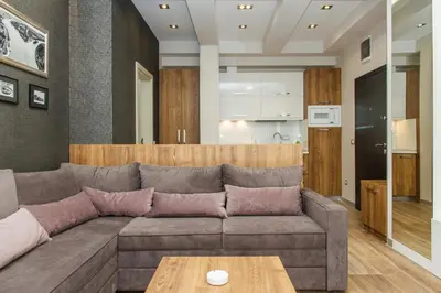 a living room with a couch and a table at Apartment Barcelona in Belgrade