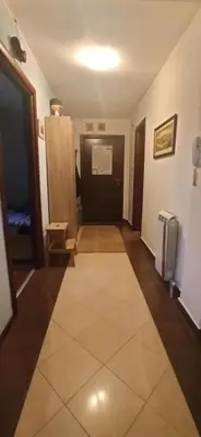 a room with a hallway with a large rug at Blossom in Belgrade