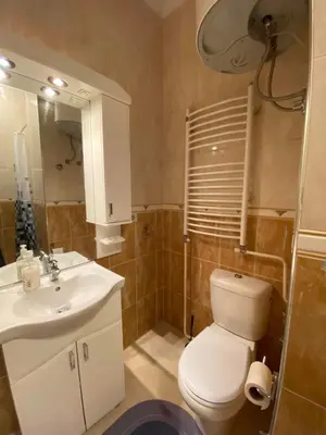 a bathroom with a white toilet and a sink at LUX Apartment in Belgrade, Centre in Belgrade
