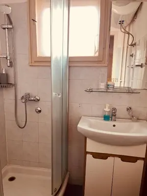 a bathroom with a shower and a sink at İstanbul apartment 2 in Belgrade