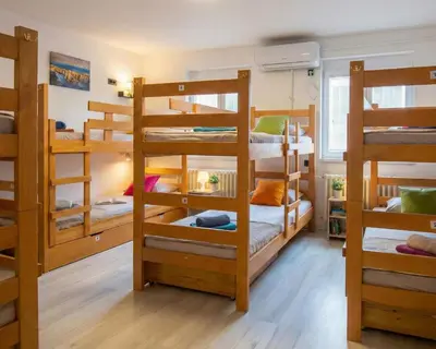 a room with four bunk beds in a house at BGD Downtown Hostel in Belgrade